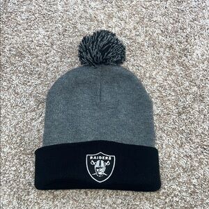 Riders by Lee Gray and Black Pom Beanie‎